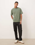 ASOS DESIGN Circular Design Collection super heavyweight relaxed t-shirt in green .