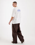 ASOS DESIGN oversized t-shirt with everyday essentials text graphic in white.