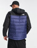 The North Face Synthetic puffer jacket in navy and black Exclusive at ASOS
