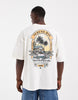 ASOS DESIGN oversized t-shirt with breach back graphic in cream.