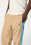 MONOGRAM TRACKSUIT - Tracksuit bottoms - croissant/bonnie