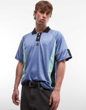 Umbro football shirt in blue and black.