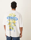 ASOS DESIGN oversized T-shirt with lemons graphic in wihite.