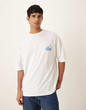 ASOS DESIGN oversized T-shirt with lemons graphic in wihite.