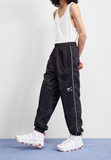 Nike Sportswear Pre-owned Tracksuit bottoms - black
