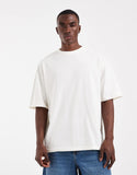 ASOS DESIGN oversized t-shirt with breach back graphic in cream.