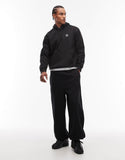 adidas Originals Trefoil Essentials hoodie in black with contrast stitch detail