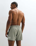 ASOS DESIGN short length swim shorts with placement print in sage green