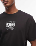 The North Face Track backprint relaxed t-shirt in black.