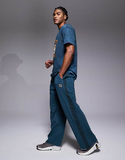Nike Training Heritage Dri-FIT joggers in blue