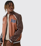 BoohooMAN Plus BM Badge Collared PU Varsity Jacket In Brown