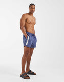 ASOS DESIGN swim shorts in short length with placement print in navy