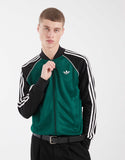 adidas Originals Superstar track top in green and black