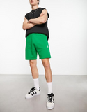 adidas Originals Trefoil Essentials shorts in green