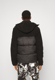 Ellesse SPARRA - Winter jacket - black