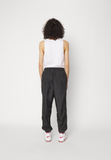Nike Sportswear Pre-owned Tracksuit bottoms - black
