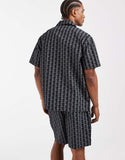 Lacoste monogram print lounge shirt in black