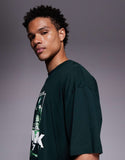 ASOS DESIGN oversized T-shirt with street graphic in dark green.