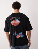 ASOS DESIGN oversized t-shirt with cocktail back print in black.