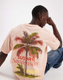 Jack & Jones oversized t-shirt with palm tree backprint in pink.