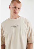 T-shirt oversize graphic in beige