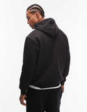 adidas Originals Trefoil Essentials hoodie in black with contrast stitch detail