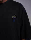 ASOS DESIGN oversized t-shirt with chest embroidery in black.