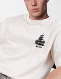 T-shirt squadrata oversize bianco sporco con stampa giapponese.