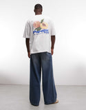 ASOS DESIGN oversized t-shirt with high build peach graphic in white.