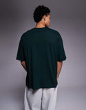 ASOS DESIGN oversized T-shirt with street graphic in dark green.