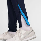 CHELSEA TRAINING TROUSERS DRI-FIT STRIKE - OBSIDIAN/PHOTO BLUE/GUAVA ICE