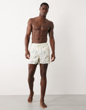 ASOS DESIGN short length seersucker swim shorts with print in ecru