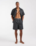 Lacoste monogram print lounge shorts with logo waistband in black