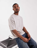 ASOS DESIGN oversized T-shirt with floral back print in gray.