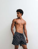 ASOS DESIGN swim shorts in mid length in black print