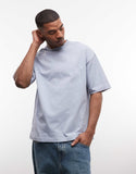 ASOS DESIGN oversized t-shirt with flamingo graphic in washed blue.