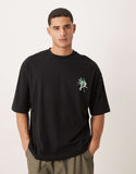 ASOS DESIGN oversized T-shirt with palm Palermo graphic in black.
