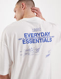 ASOS DESIGN oversized t-shirt with everyday essentials text graphic in white.