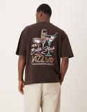 ASOS DESIGN oversized T-shirt with jazz bar graphic in brown.