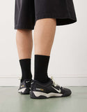 Nike T90 sneakers in black