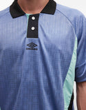 Umbro football shirt in blue and black.