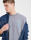 ASOS DESIGN heavyweight boxy oversized T-shirt with floral graphic in green wash.