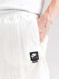 Nike Sportswear Regular Pants 'AIR' in Cream, Ecru