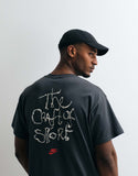 Nike arts club graphic t-shirt in black.