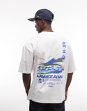 ASOS DESIGN oversized t-shirt with mountain graphic in white.