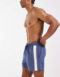 ASOS DESIGN swim shorts in short length with placement print in navy