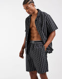 Lacoste monogram print lounge shorts with logo waistband in black