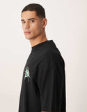 ASOS DESIGN oversized T-shirt with palm Palermo graphic in black.