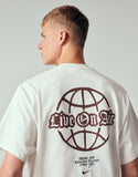 Nike Solo Swoosh graphic back print t-shirt in beige.