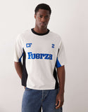ASOS DESIGN boxy oversized t-shirt with cut and sew panelling and sports graphics in off white.